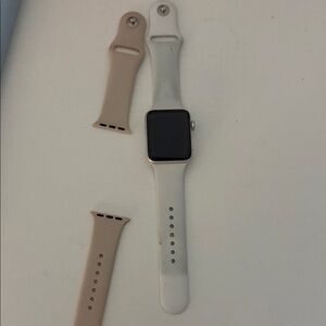 Apple Smartwatch with White and Tan Bands